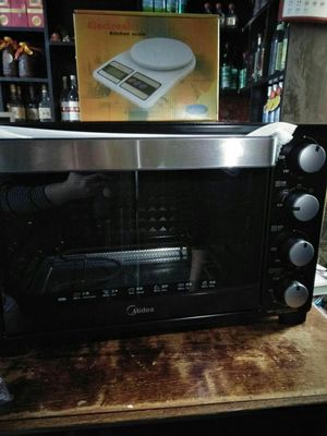 美的 T3-L323D电烤箱好吗？看购买者的评论就清楚了！